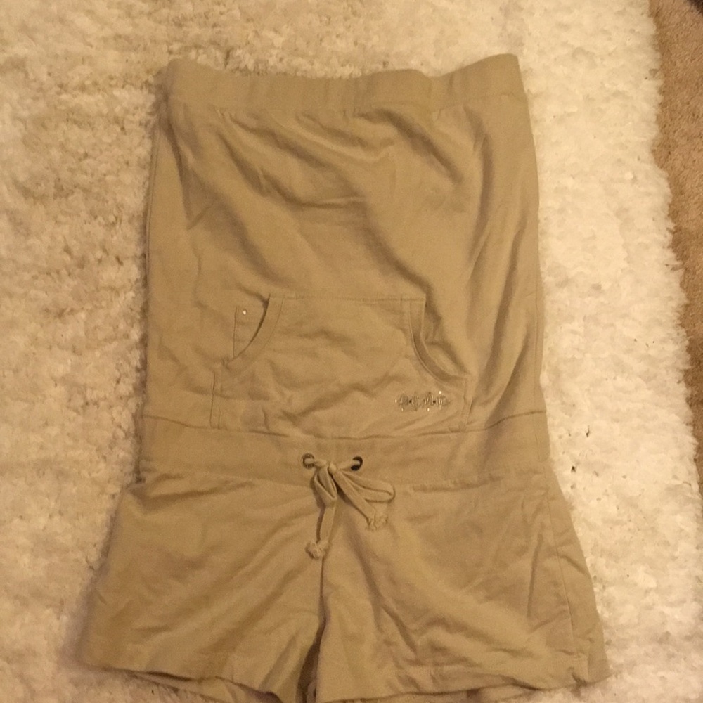 Tan color romper with elastic top band and mid